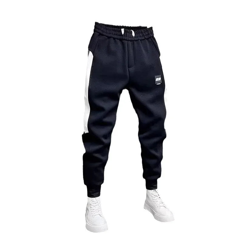 Kinga | Luźne Spodnie Jogger w Paski
